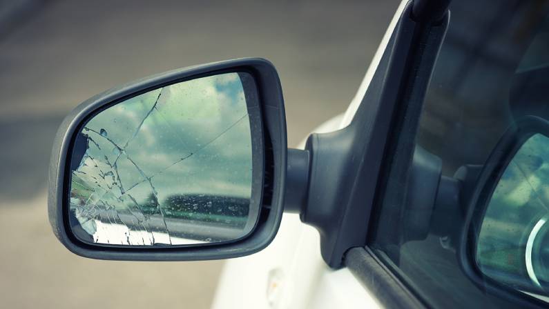 Broken car wing mirror.