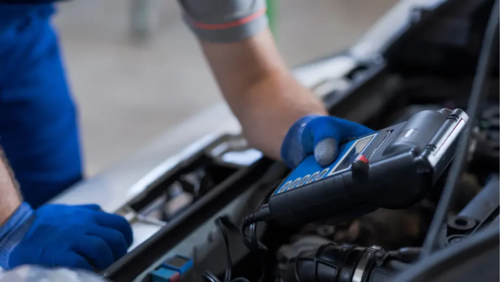 Professional mechanic doing a car inspection