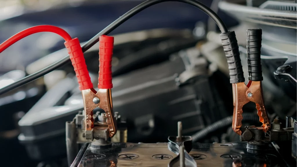 Auomobile repair, machine batteries car engine checking car battery cleaning for deliver customers in the car service.