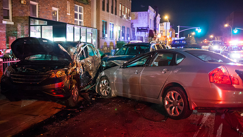 Multiple car crash night city emergency severe damage